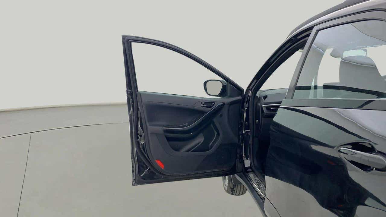 Front door open view of a Tata Nexon