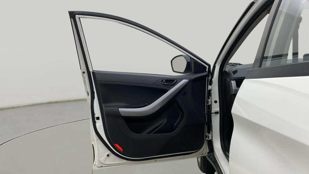 Front driver side door open view of a Tata Nexon 2017-2023