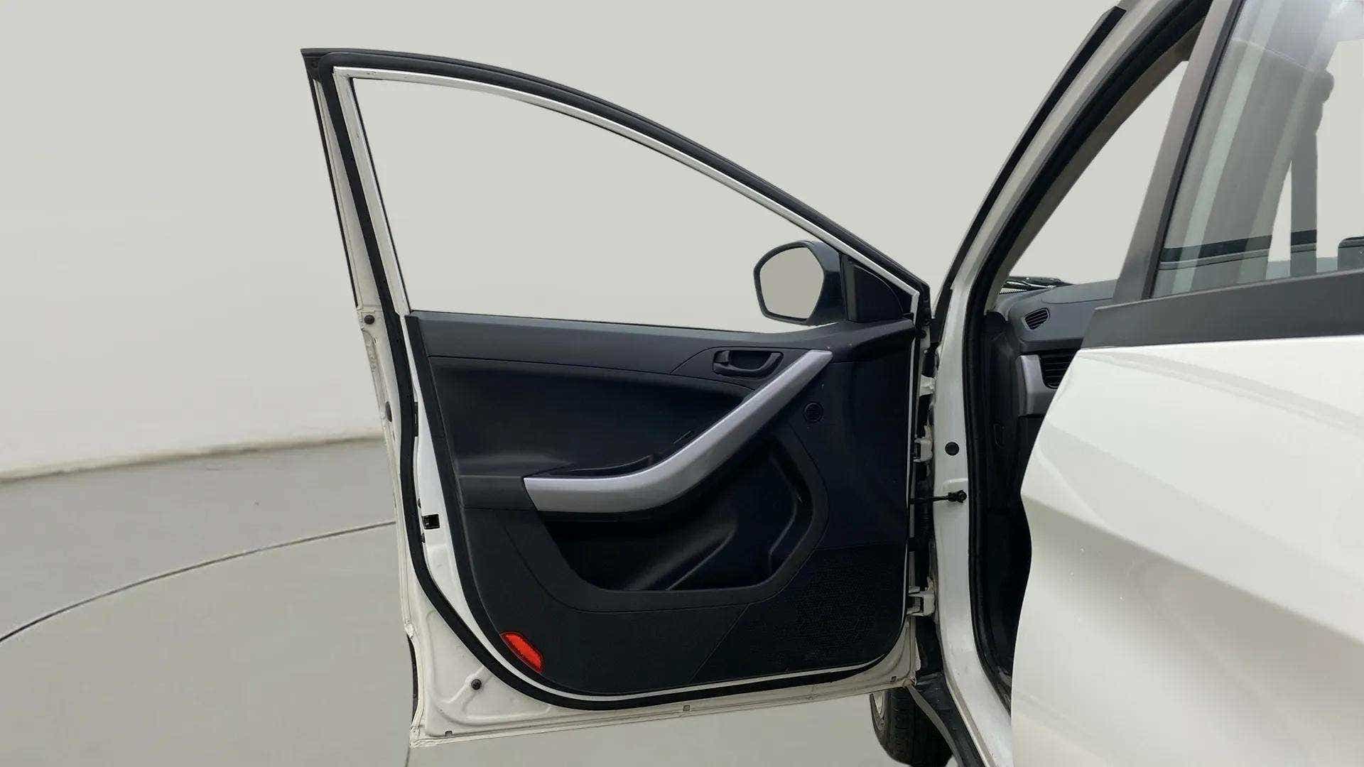Front driver side door open view of a Tata Nexon 2017-2023