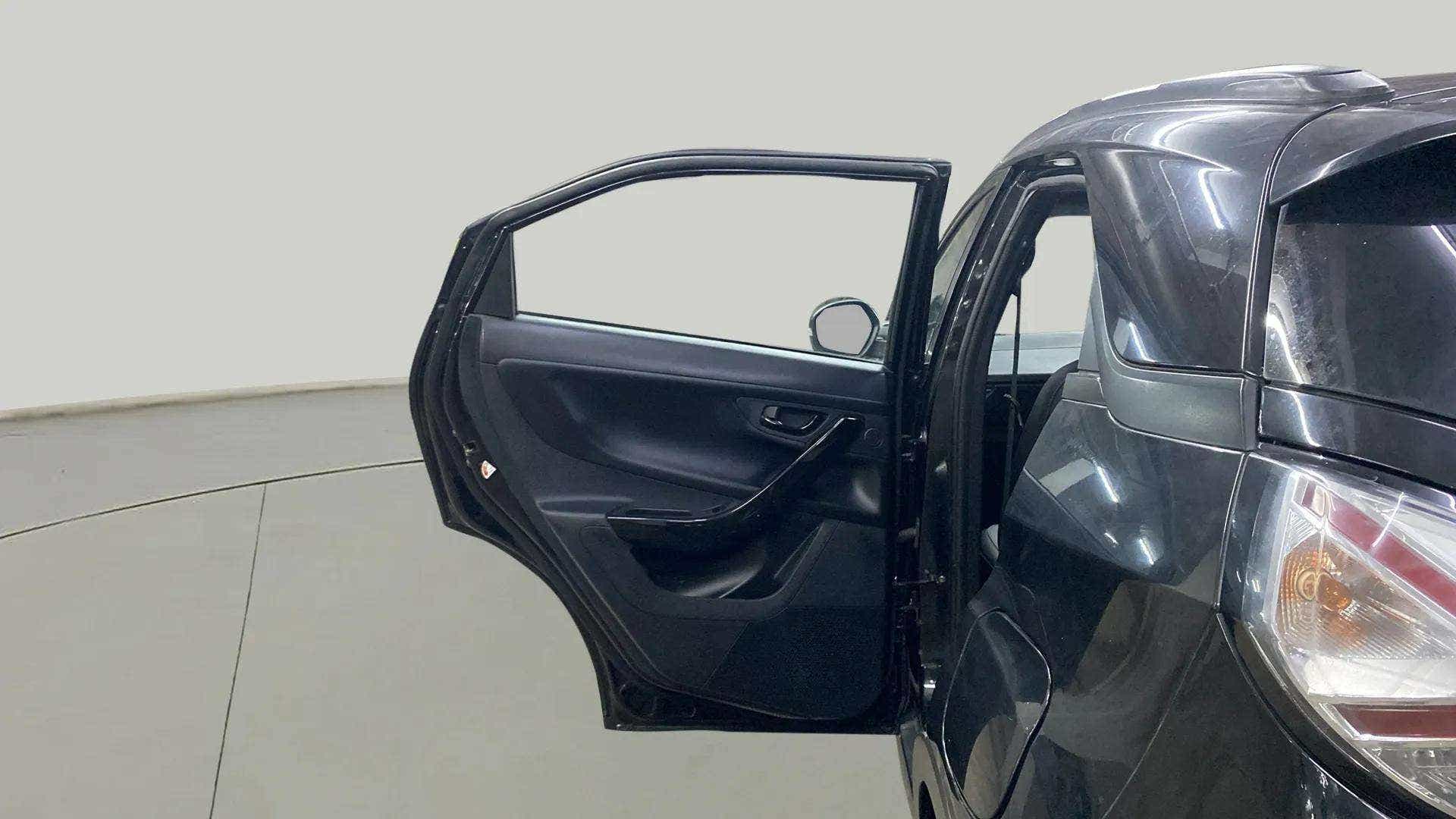 Rear left door and taillight view of a Tata Nexon 2017-2023