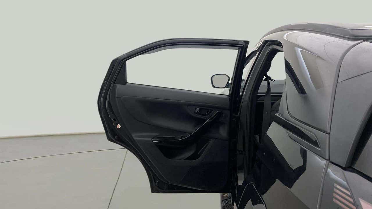 Rear door open view of a Tata Nexon