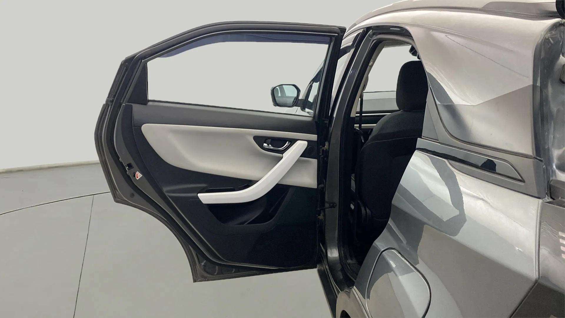 Rear door and partial side view of a Tata Nexon 2017-2023