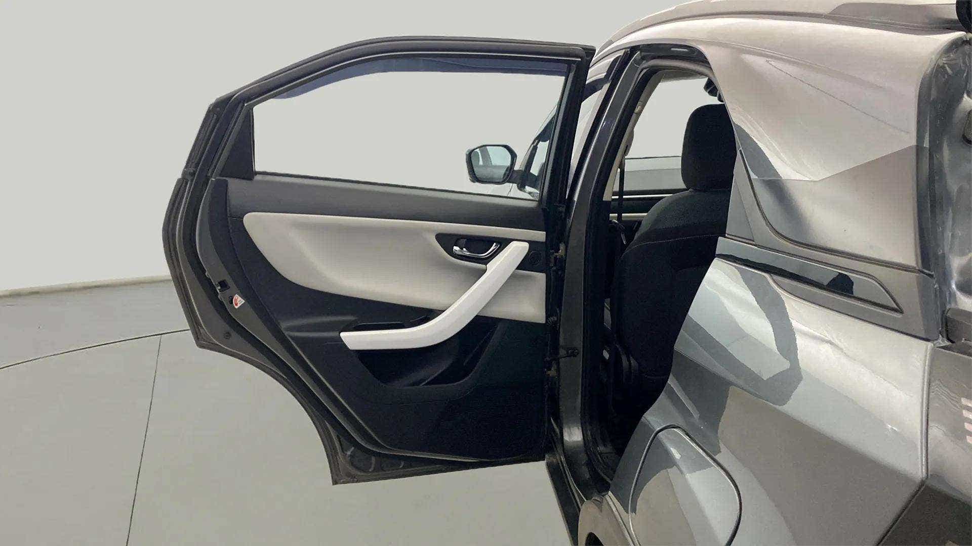 Rear door and partial side view of a Tata Nexon 2017-2023