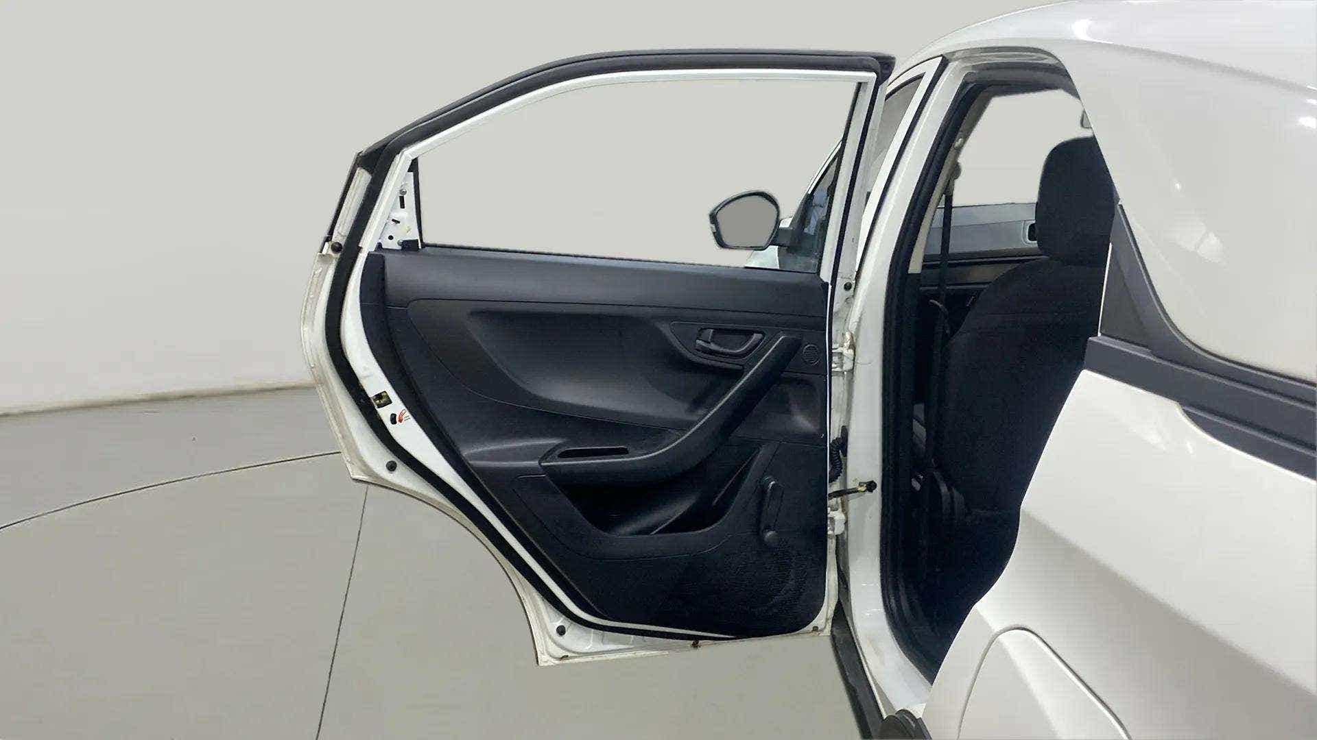 Rear door and partial interior view of a Tata Nexon