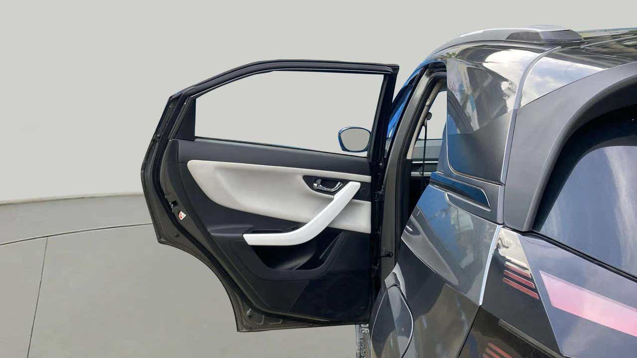 Rear door open view of a Tata Nexon
