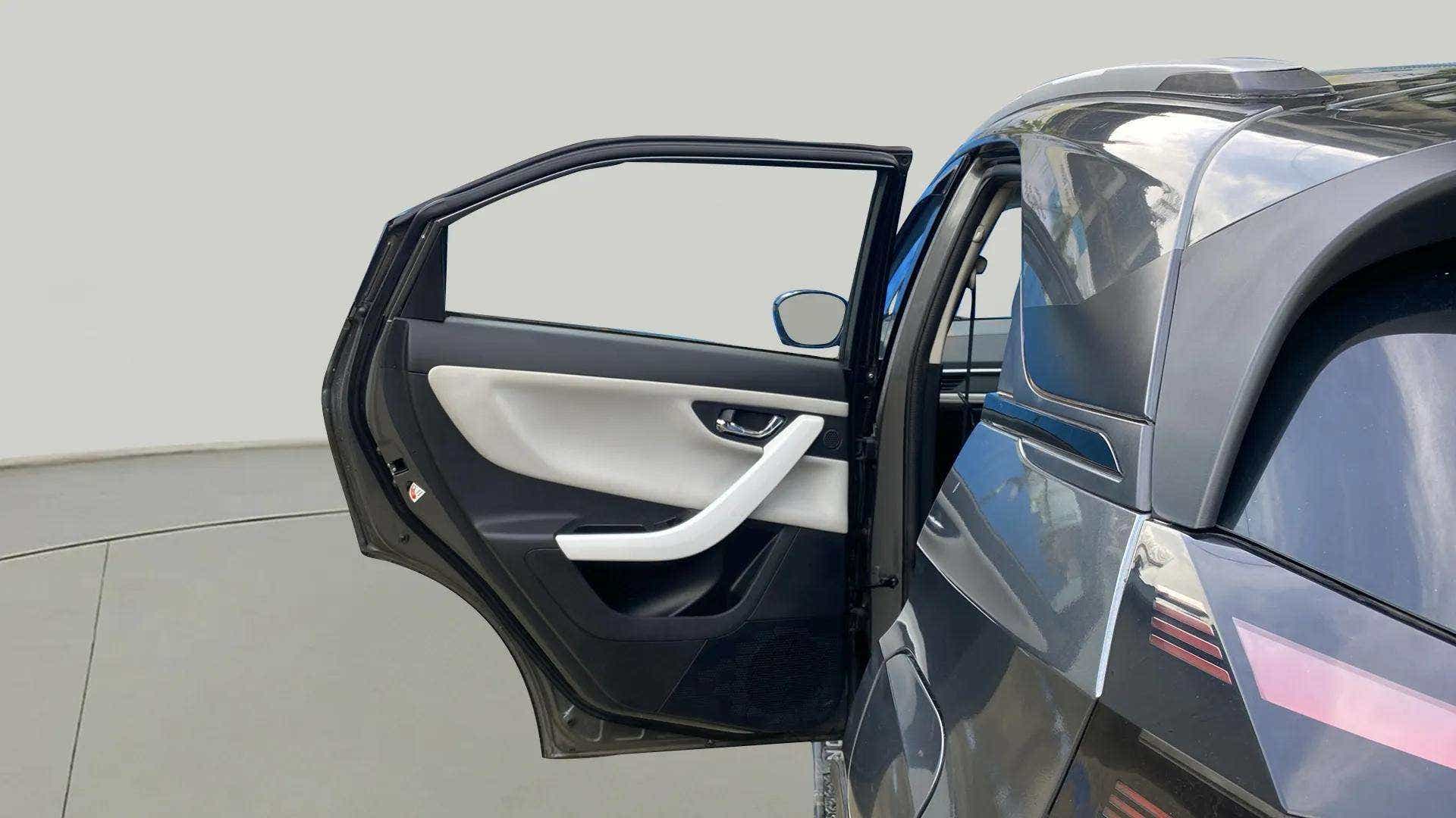 Rear door open view of a Tata Nexon