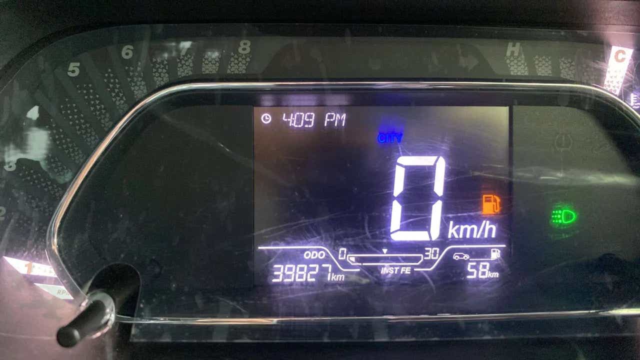 Instrument cluster of a Tata Nexon 2017-2023 displaying odometer and fuel indicators