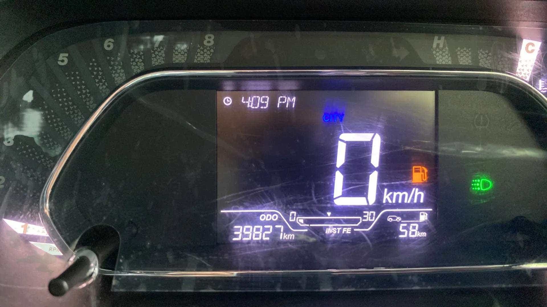 Instrument cluster of a Tata Nexon 2017-2023 displaying odometer and fuel indicators