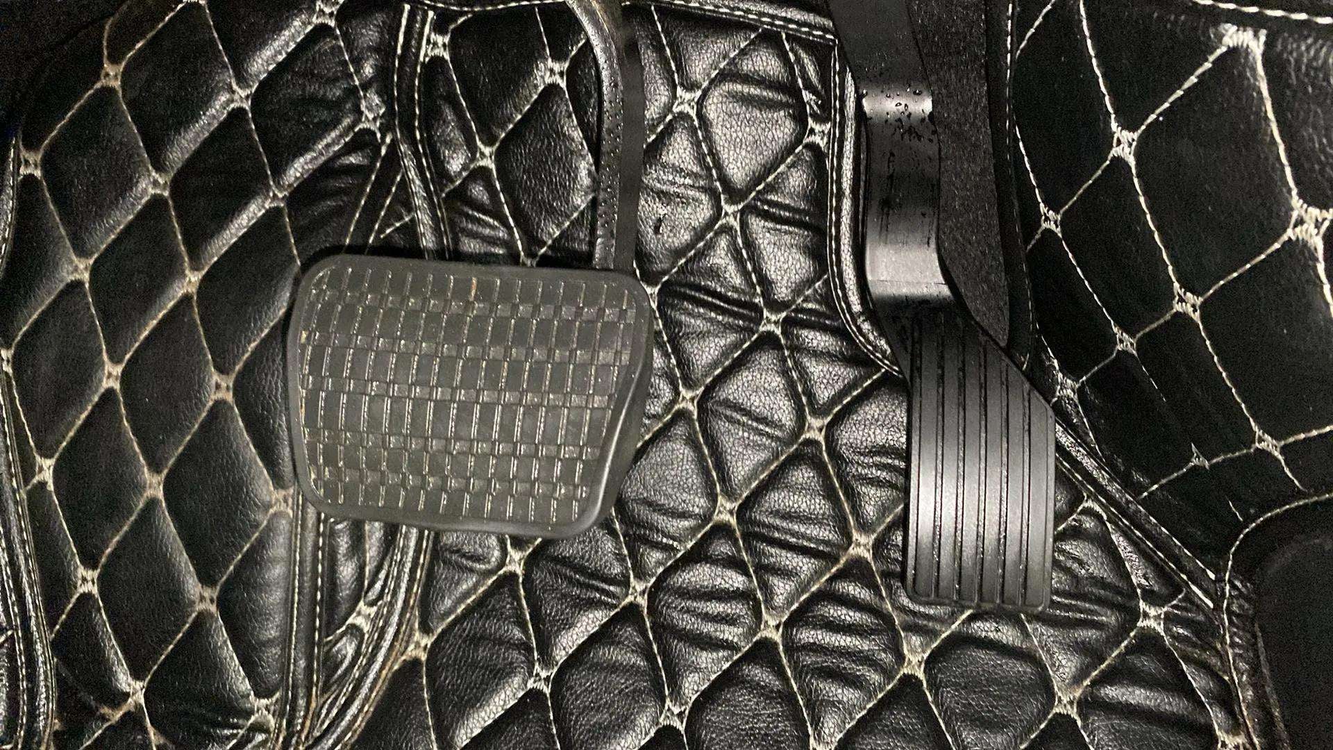 Pedals and floor mats of a Tata Nexon