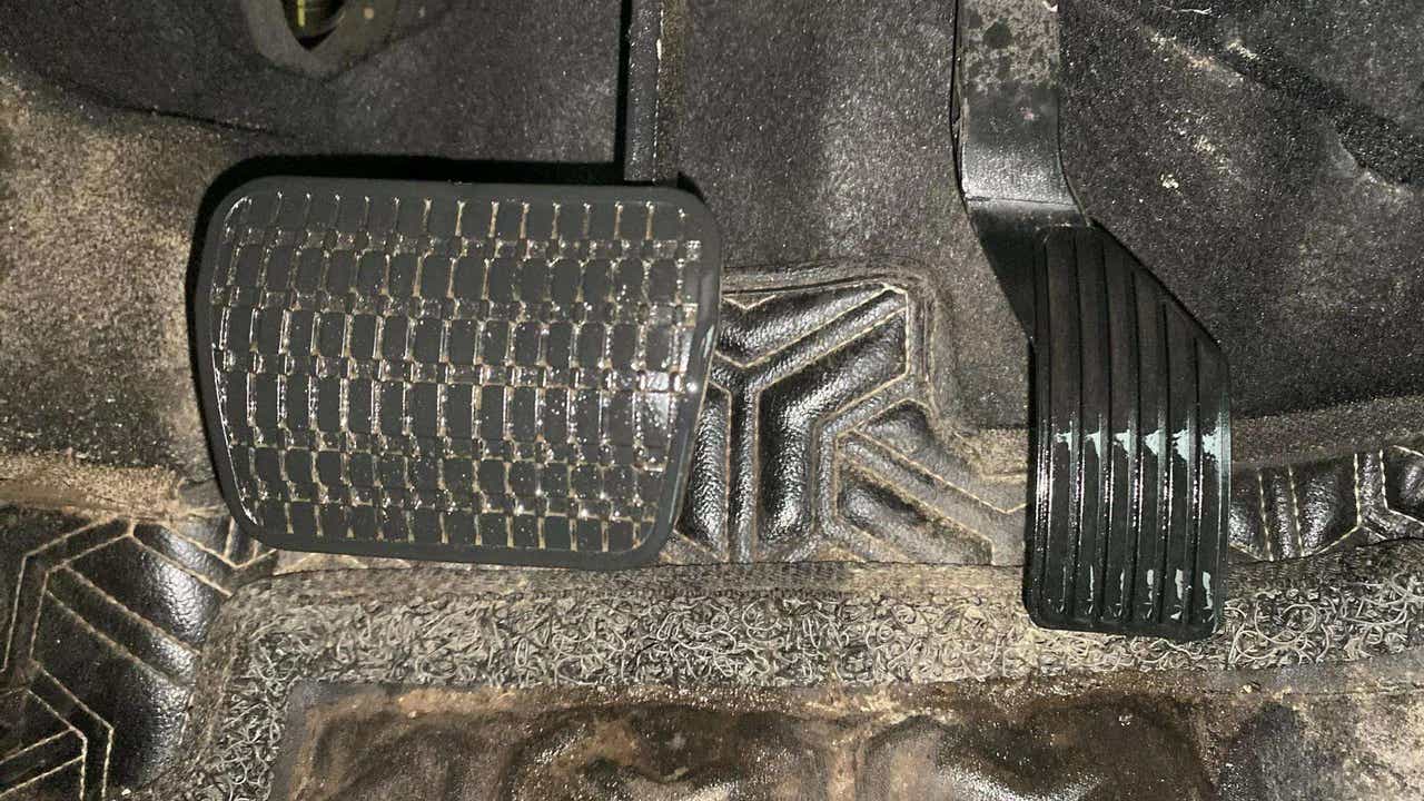 Footwell close-up showing pedals of a Tata Nexon