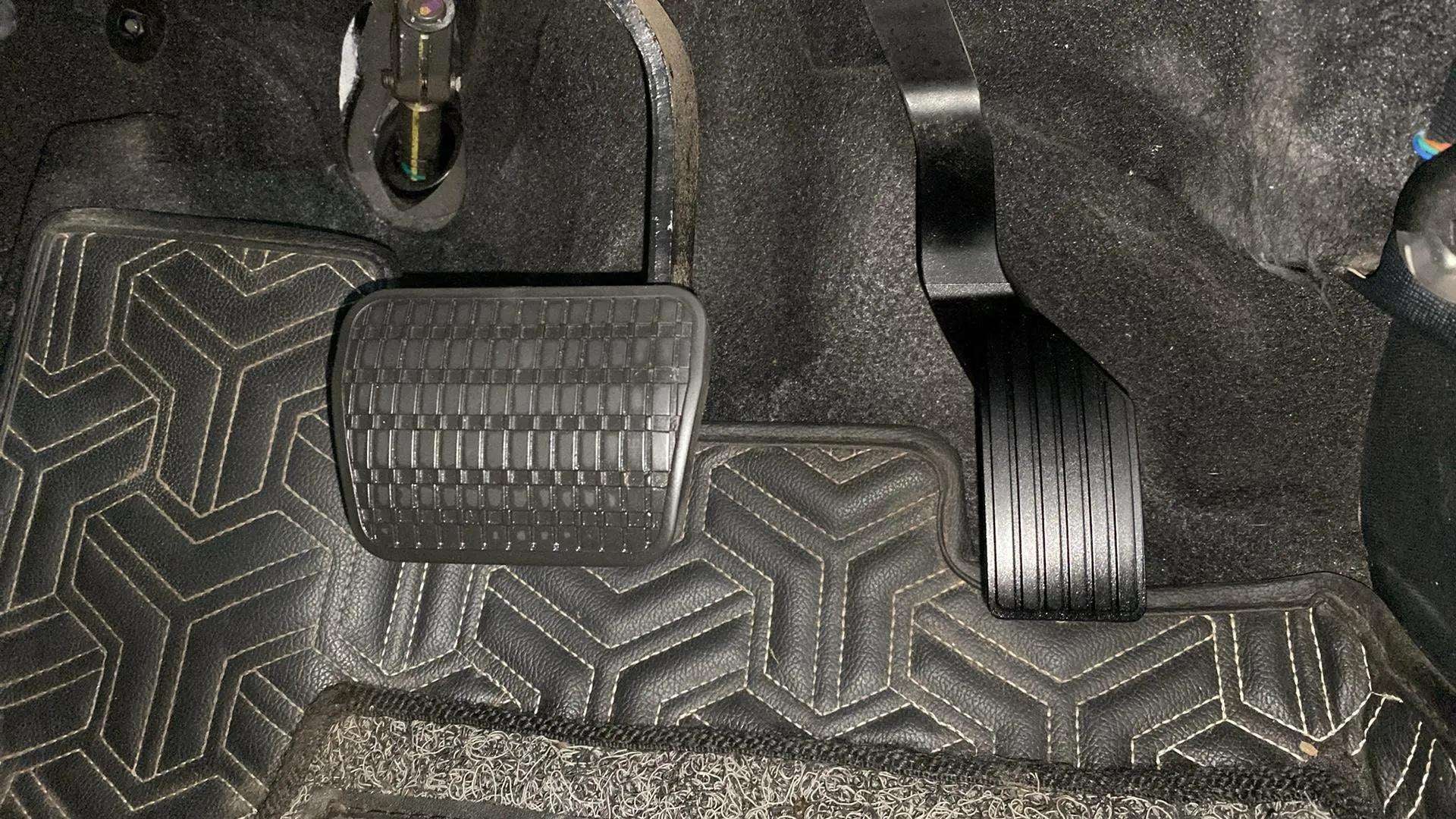 Close-up of foot pedals in a Tata Nexon