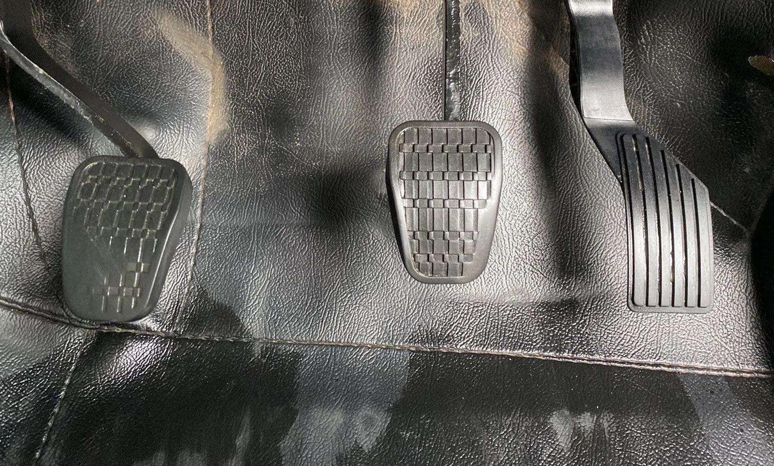 Close-up of the pedal set of a Tata Nexon 2017-2023