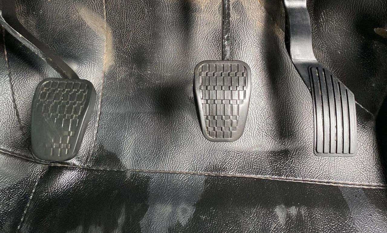Close-up of the pedal set of a Tata Nexon 2017-2023