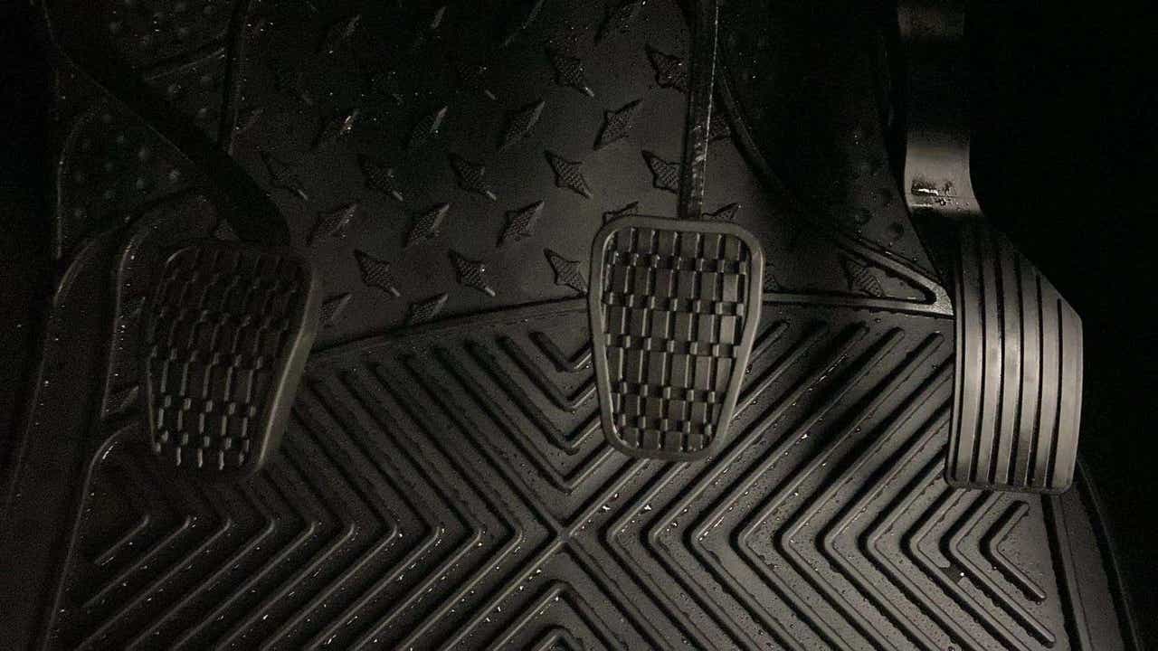 Foot pedals and mat area of a Tata Nexon 2017-2023