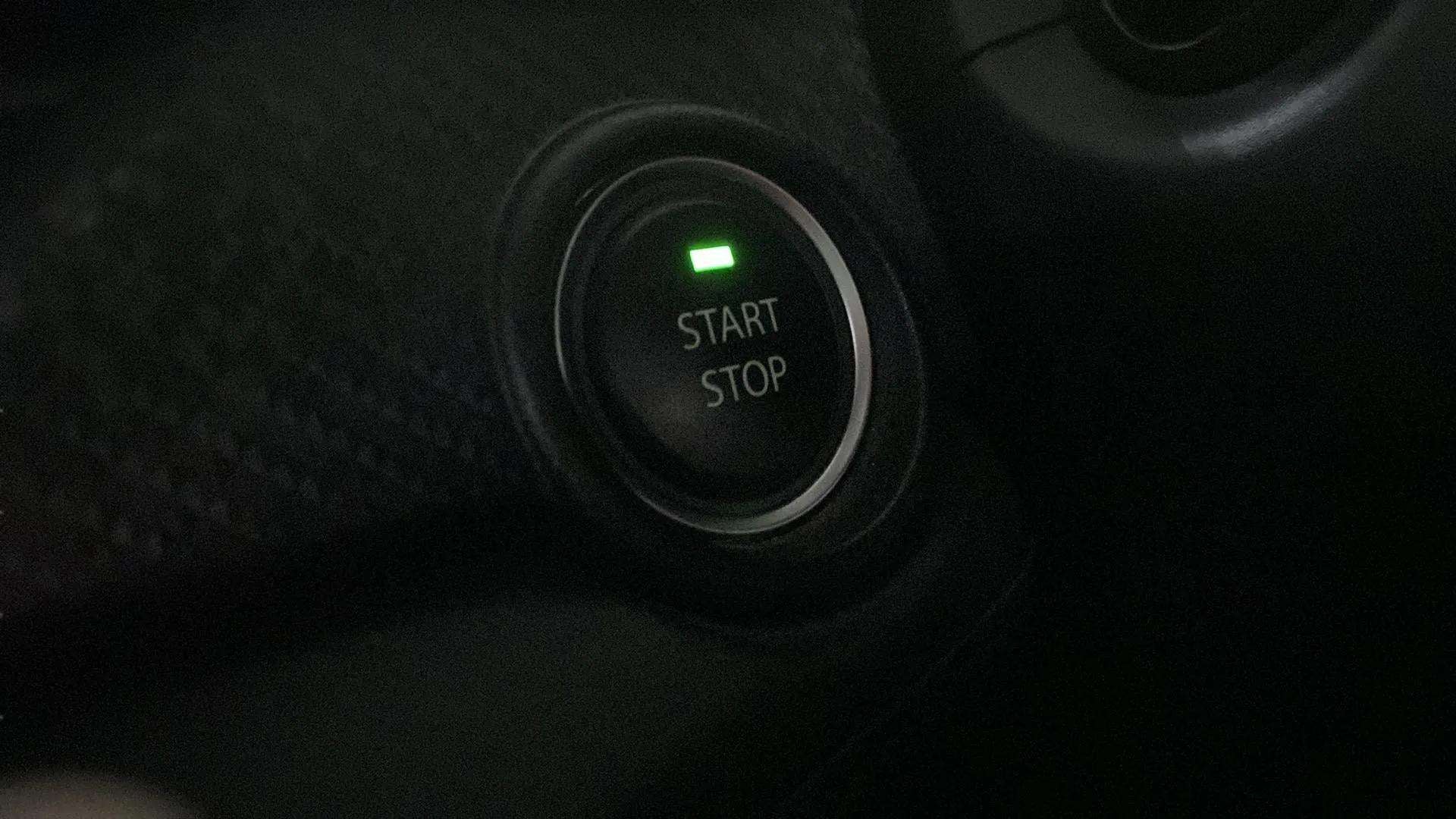 Close-up of the start stop button in a Tata Nexon
