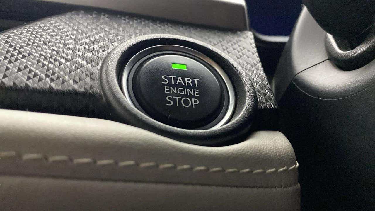 Close-up of engine start-stop button of a Tata Nexon