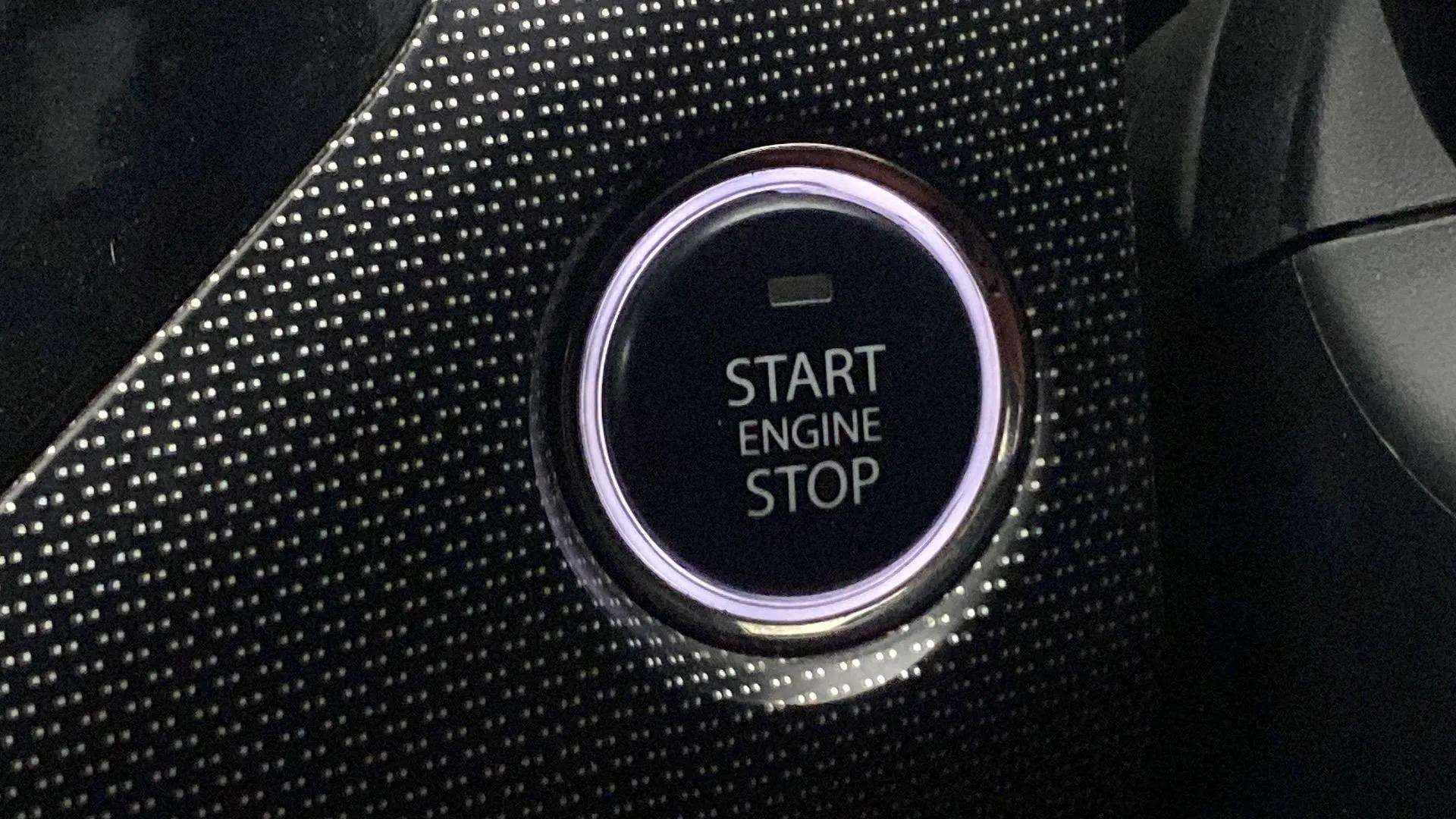 Close-up of start engine stop button of a Tata Nexon 2017-2023