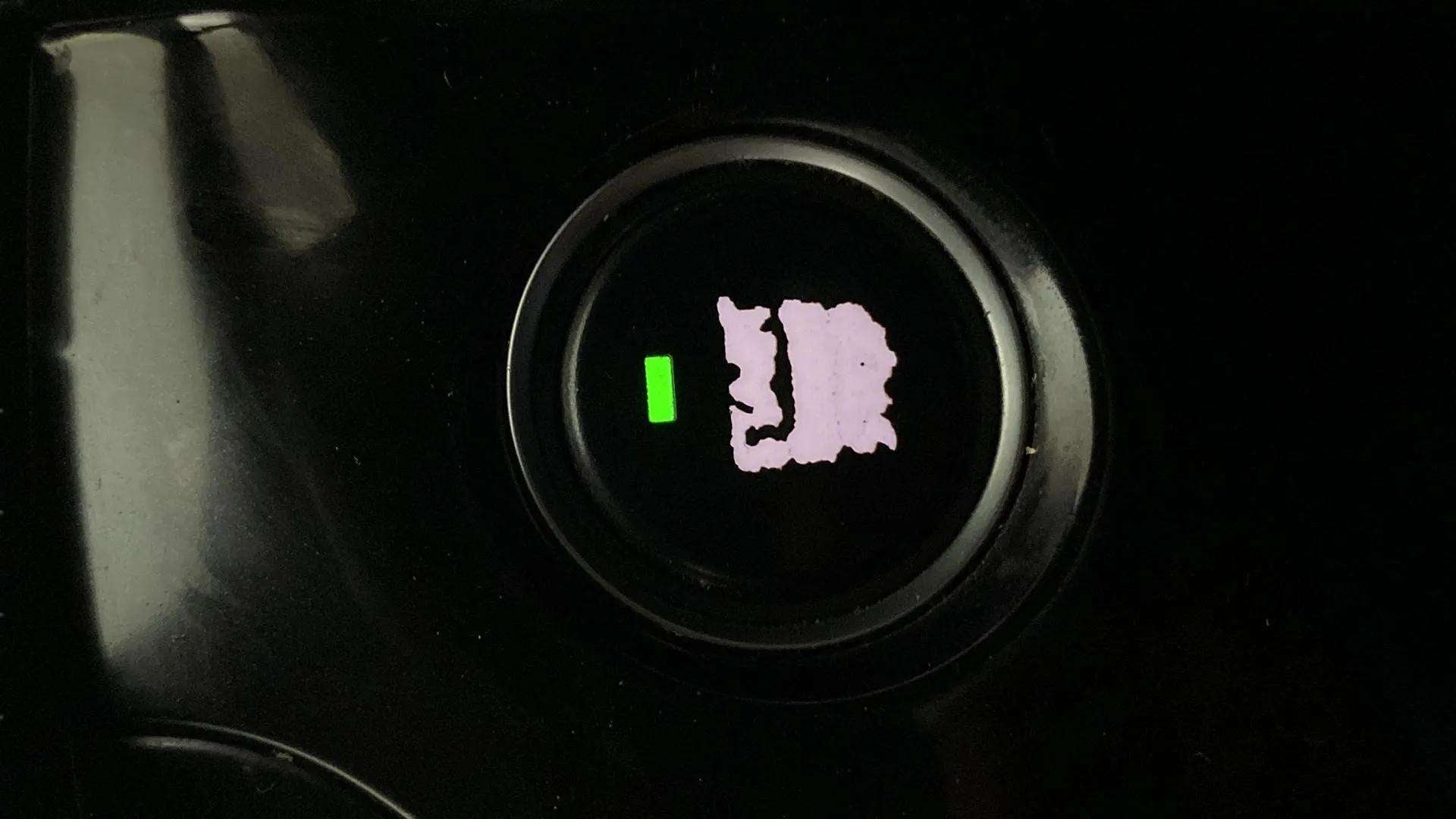 Close-up of a push start button of a Tata Nexon 2017-2023