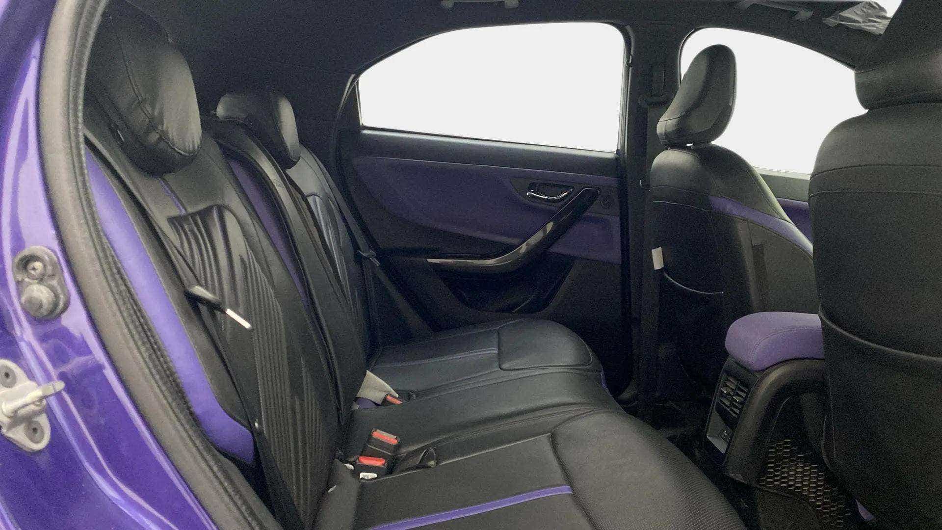 Rear seat and interior door view of a Tata Nexon 2017-2023