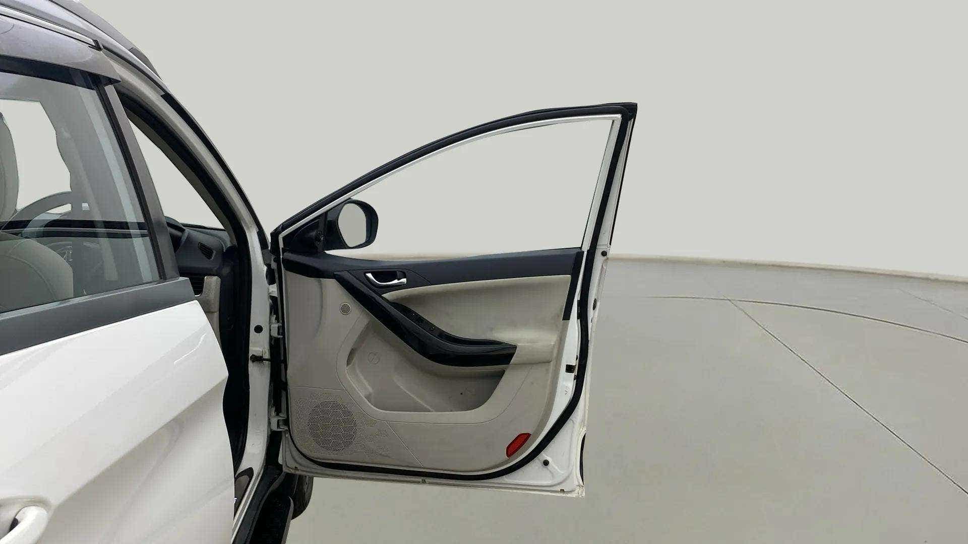 Front driver side door open view of a Tata Nexon 2017-2023