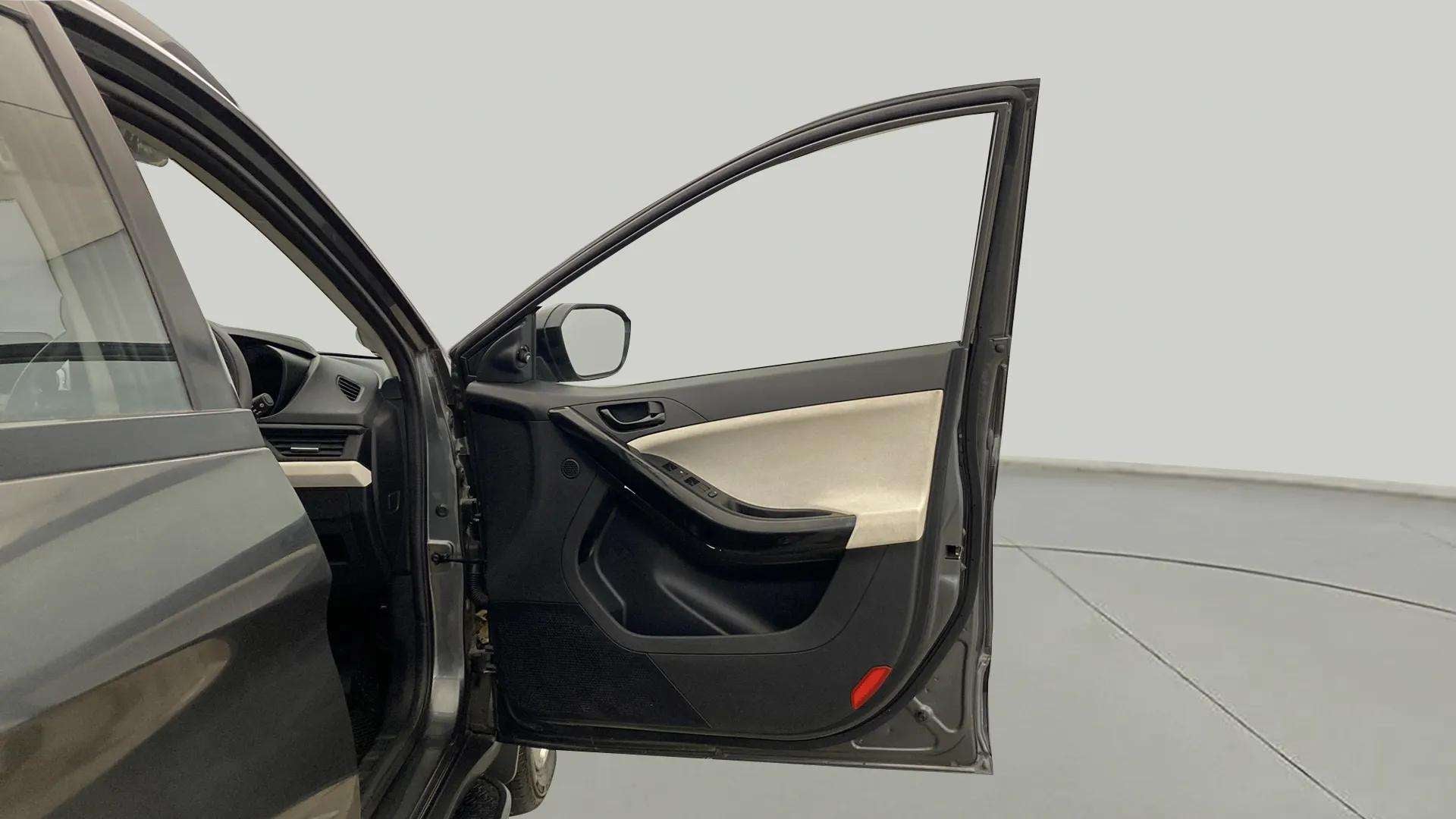 Driver side door panel of a Tata Nexon