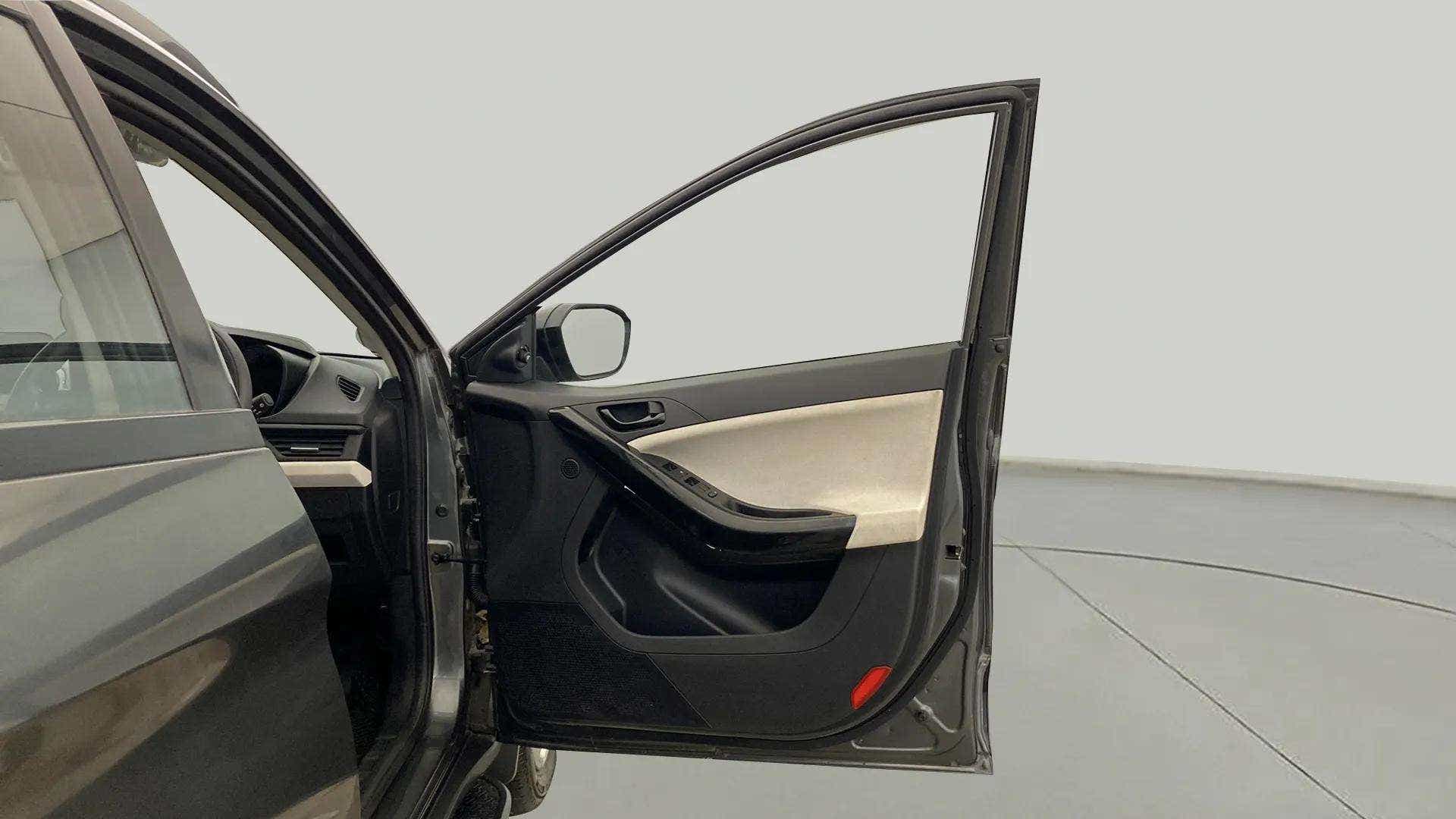 Driver side door panel of a Tata Nexon