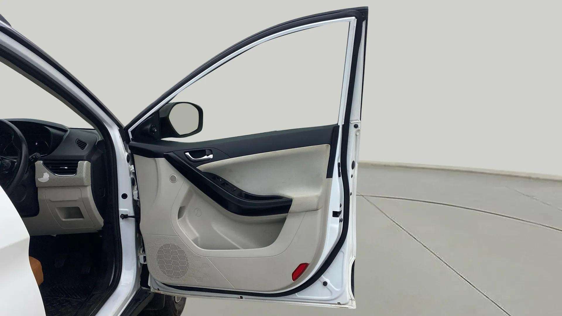 Driver side door and dashboard of a Tata Nexon 2017-2023