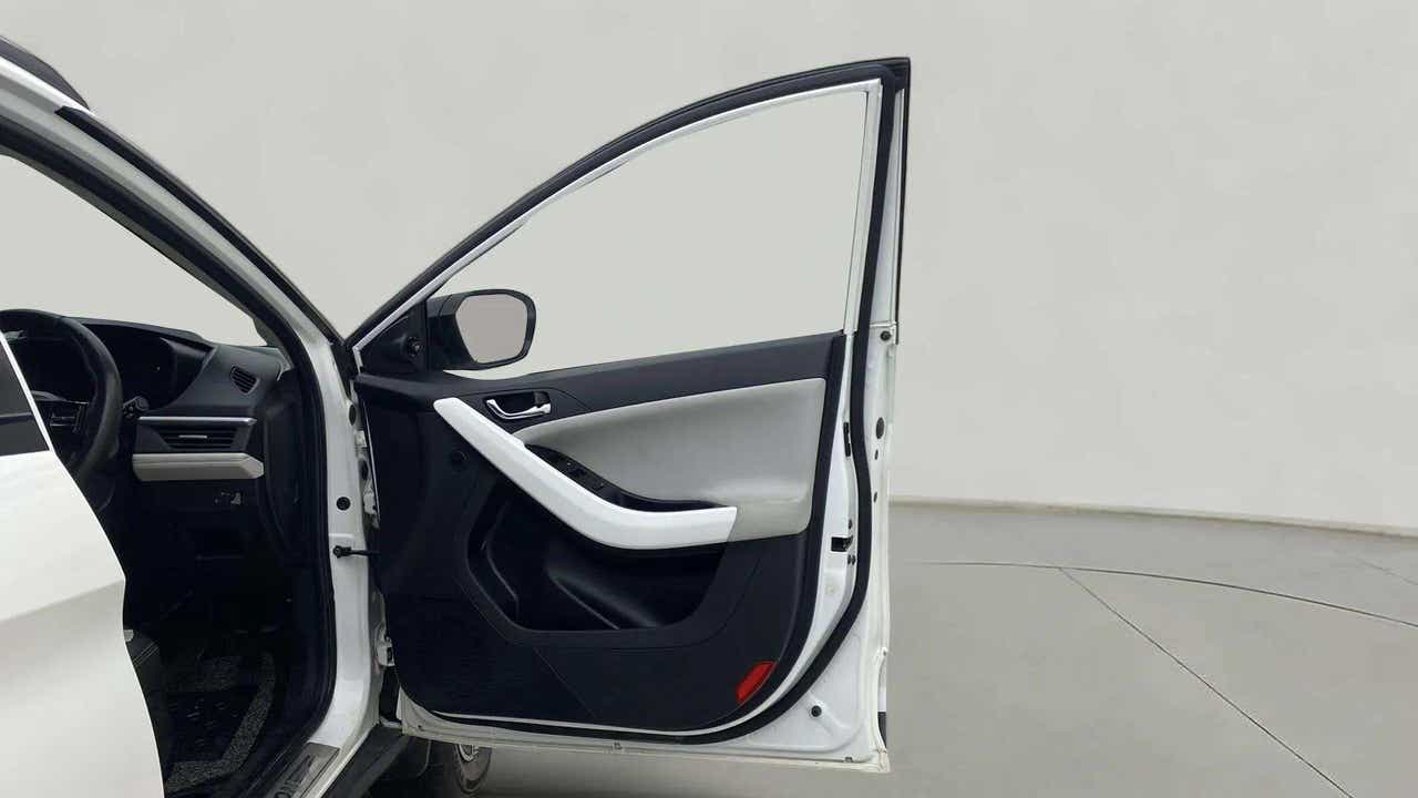 Front driver-side door interior of a Tata Nexon 2017-2023