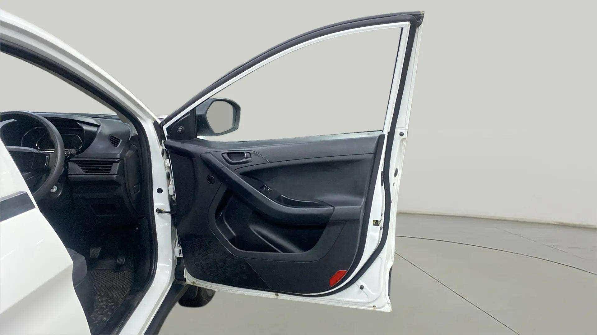 Front driver side door and dashboard of a Tata Nexon