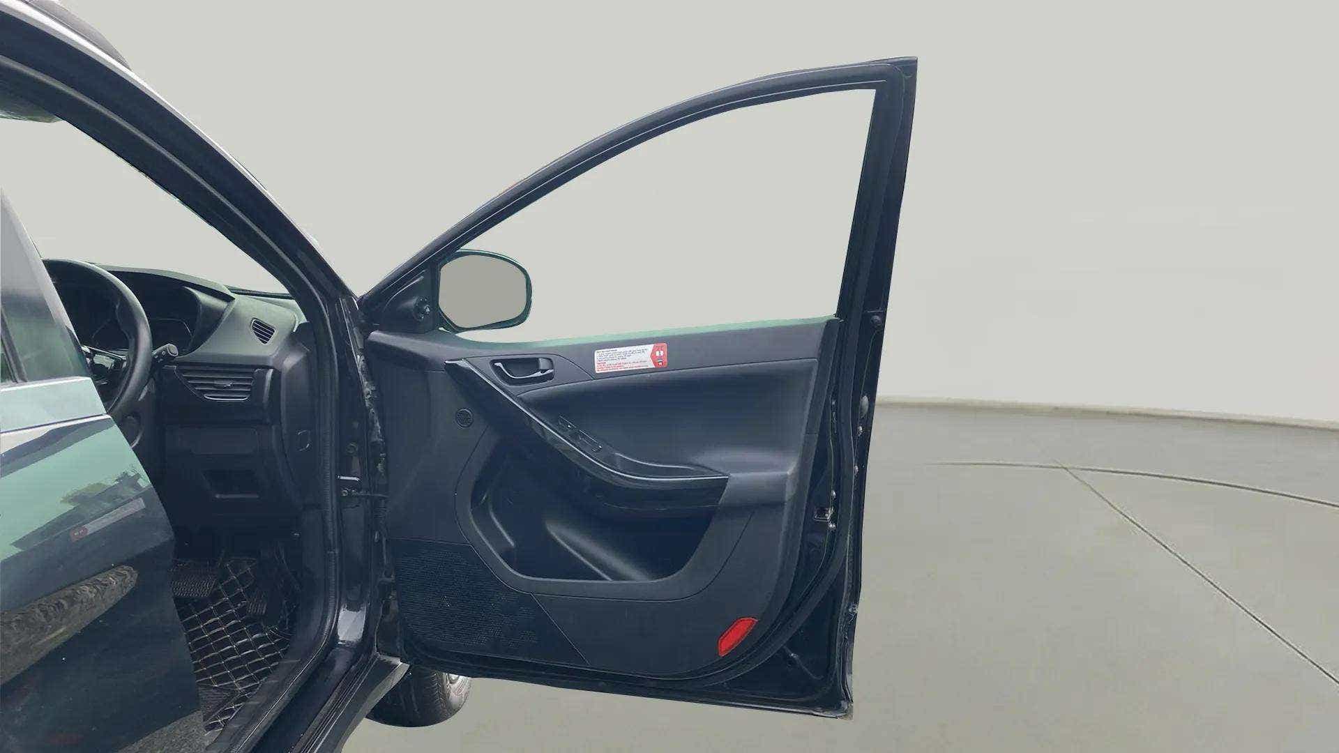 Driver side door interior of a Tata Nexon 2017-2023
