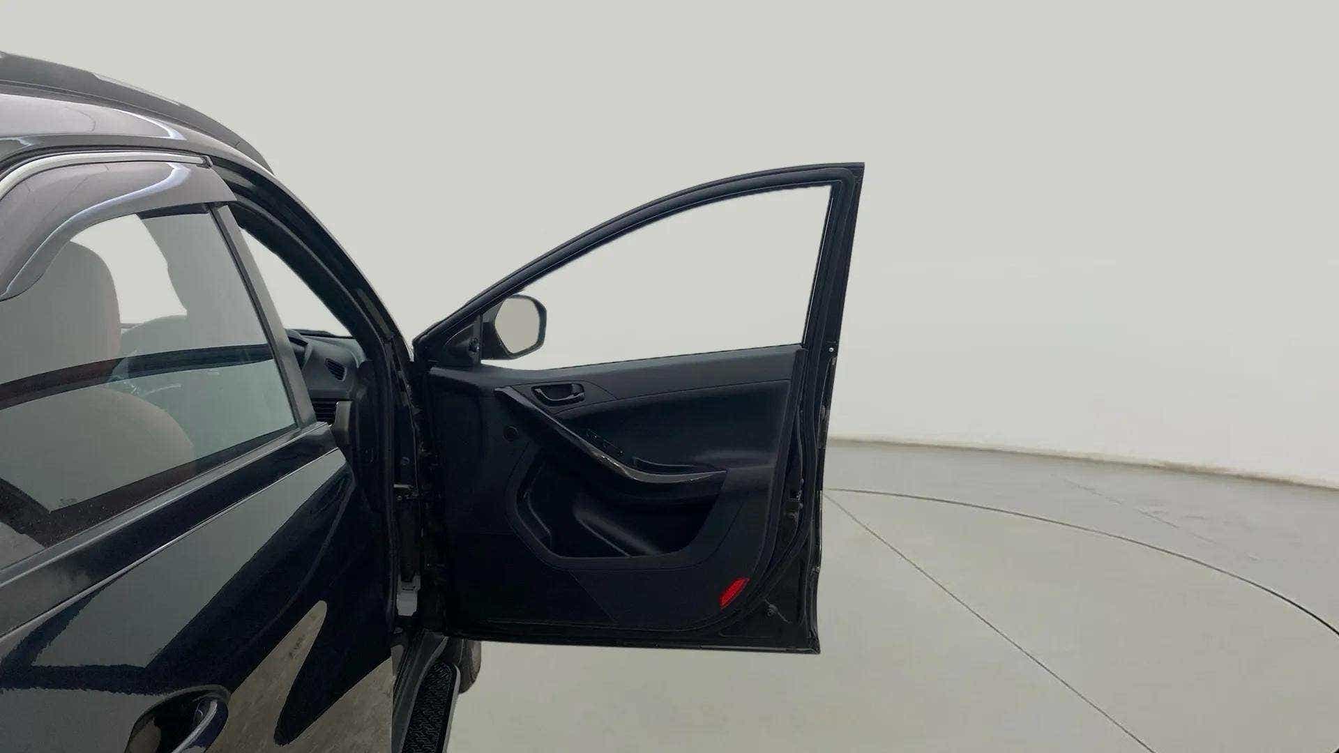 Front driver side door open view of a Tata Nexon 2017-2023