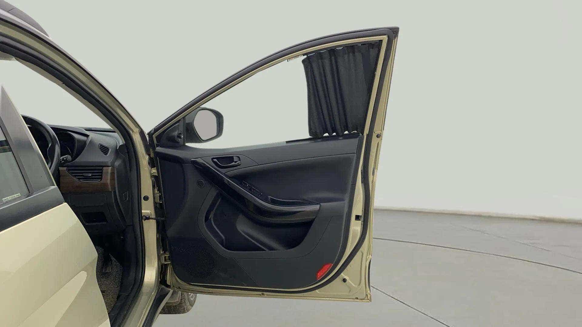 Driver side interior door panel of a Tata Nexon 2017-2023
