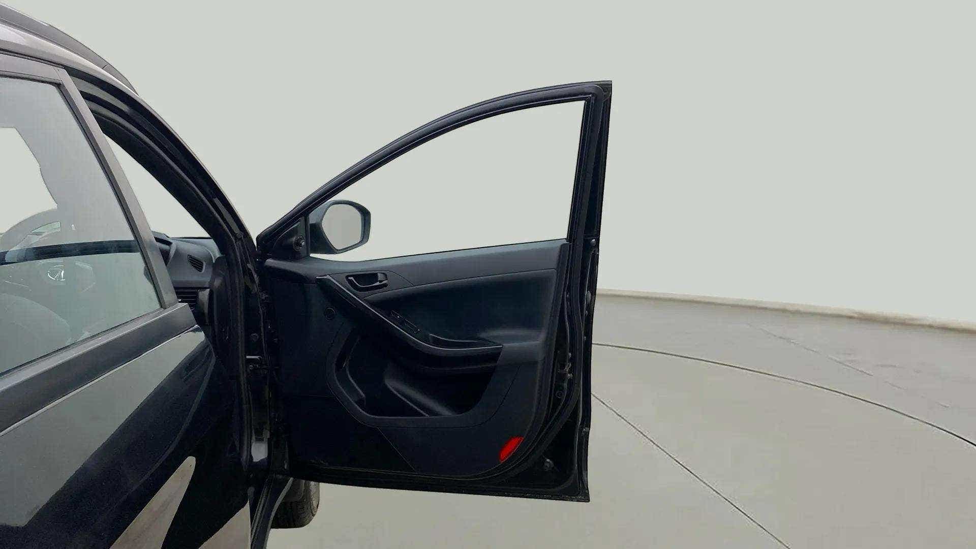 Front driver side door open view of a Tata Nexon 2017-2023