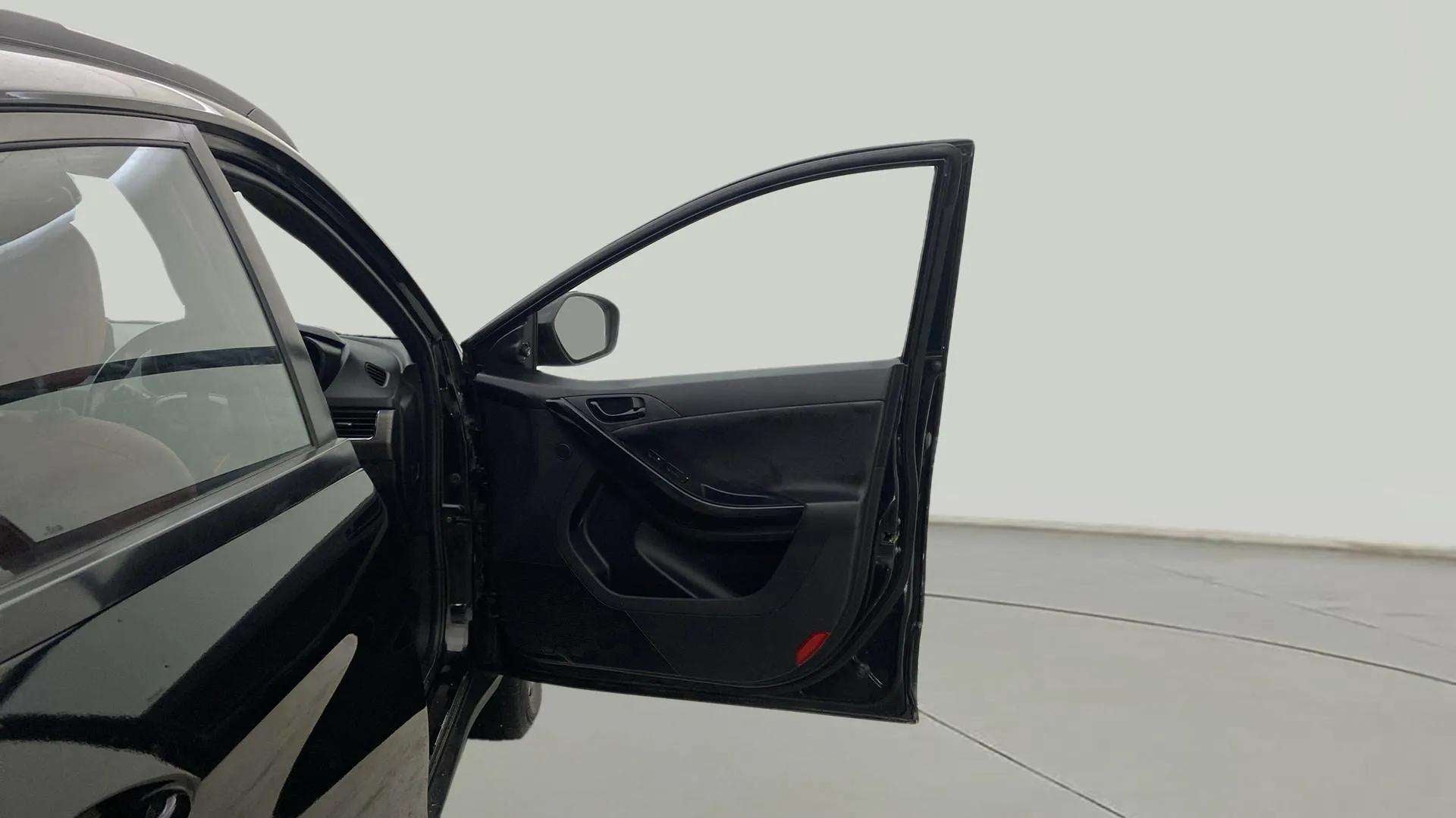 Front left door open view of a Tata Nexon 2017-2023