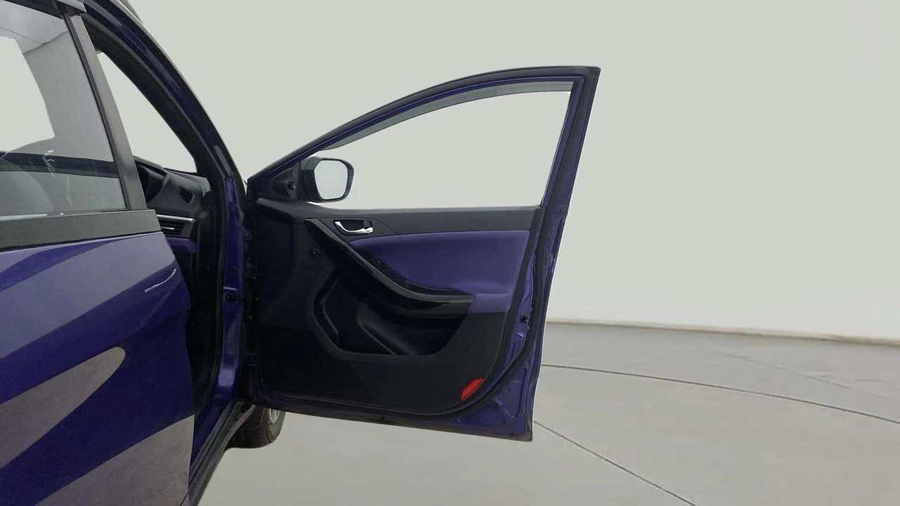 Front driver-side door view of a Tata Nexon