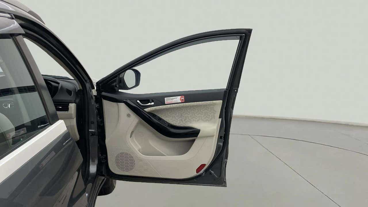 Driver door interior of a Tata Nexon 2017-2023