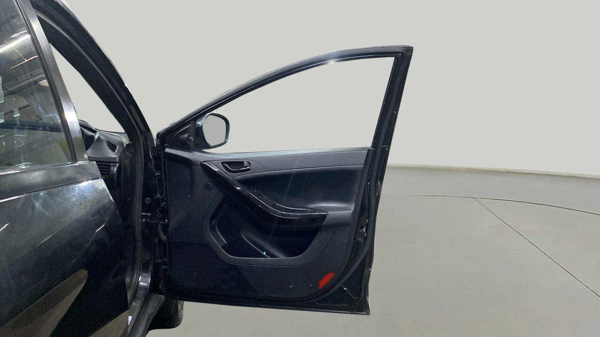 Front driver-side door interior of a Tata Nexon 2017-2023