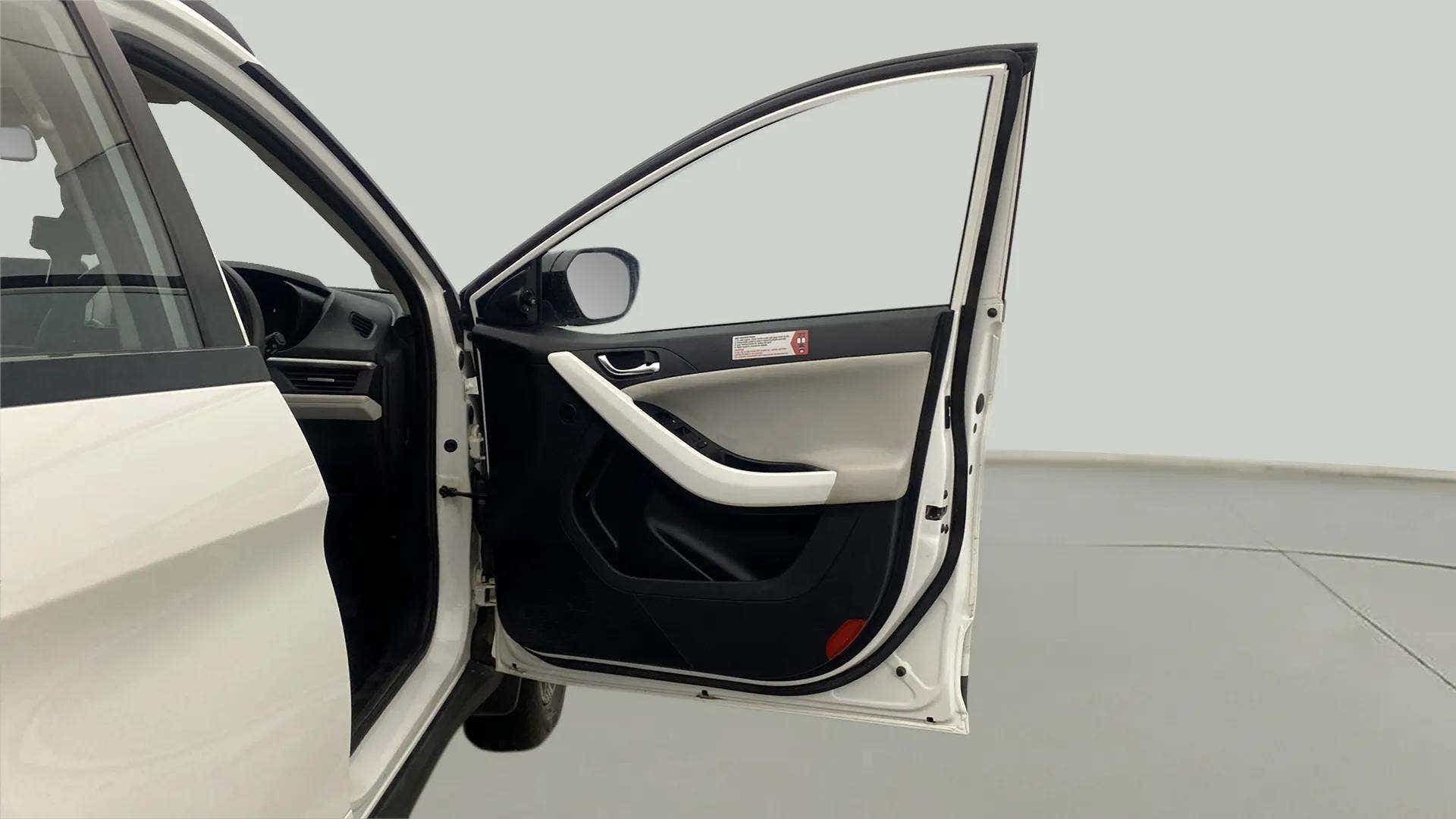 Front driver door panel of a Tata Nexon