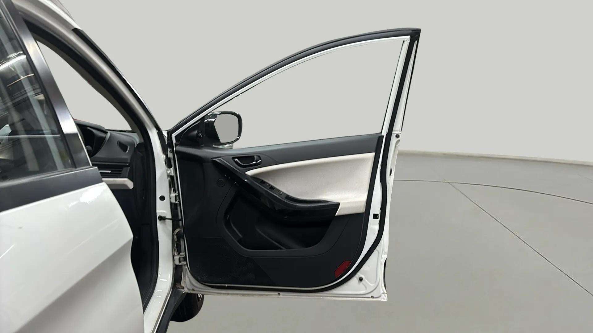 Driver side door interior of a Tata Nexon