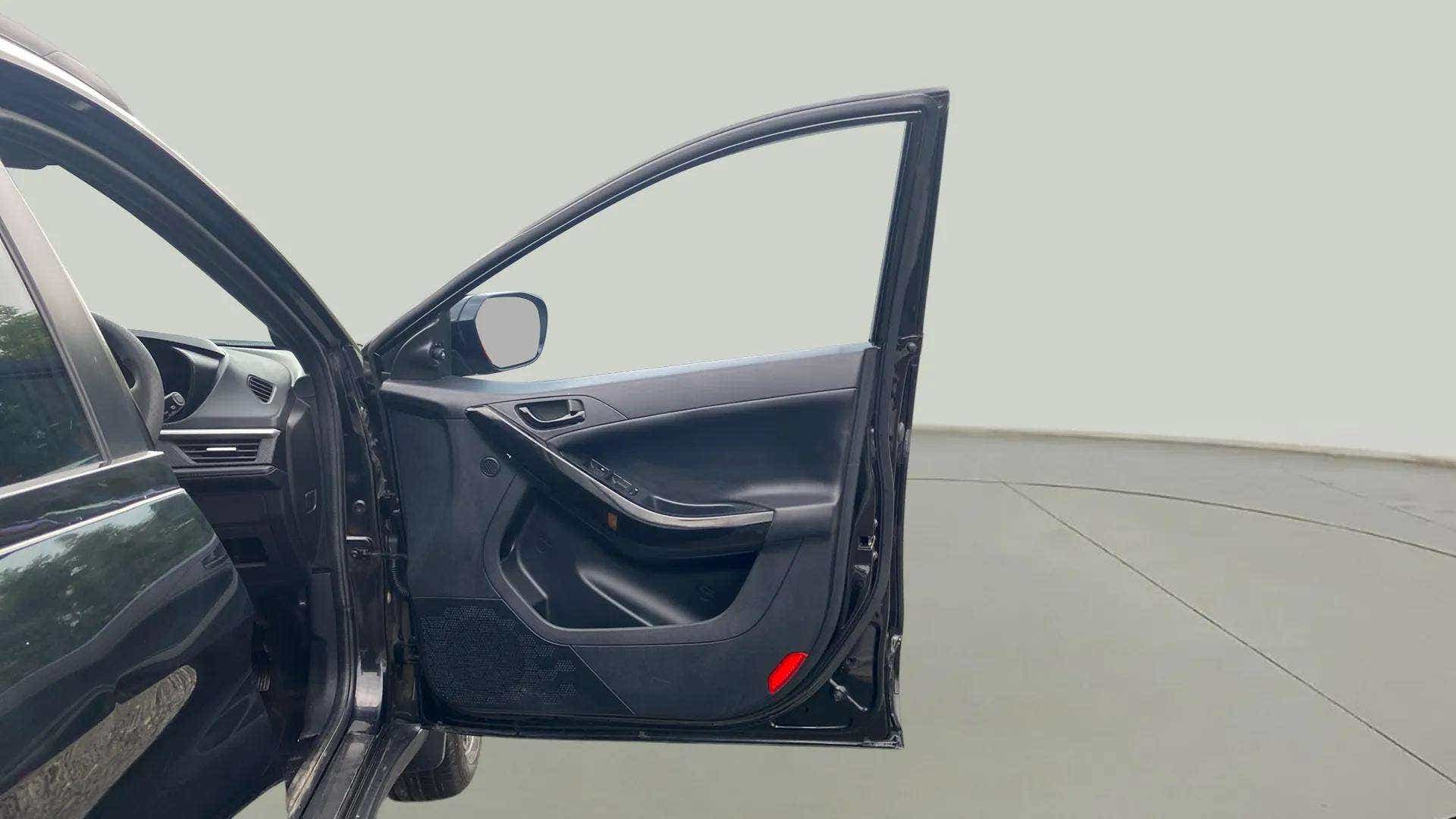 Front driver-side door panel of a Tata Nexon