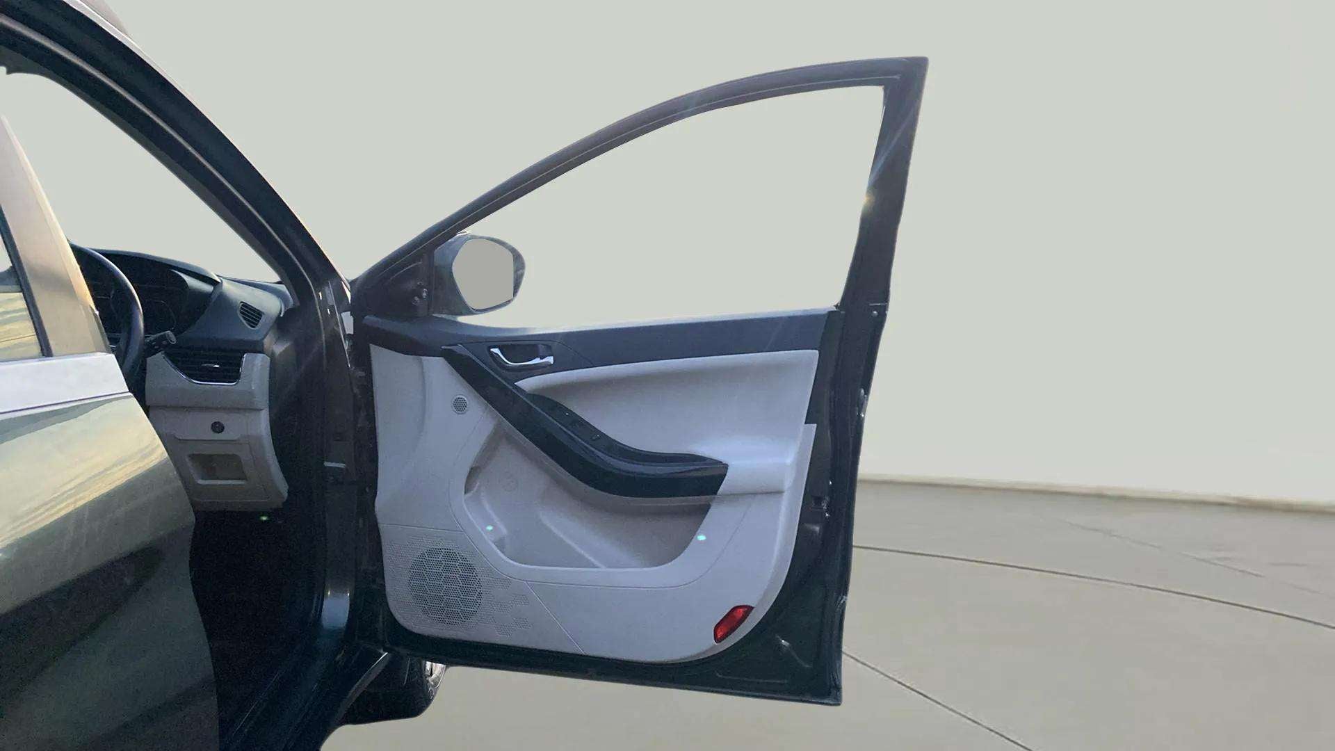 Driver door panel view of a Tata Nexon 2017-2023