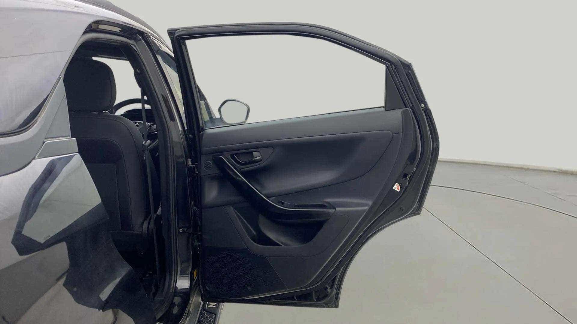 Open rear door interior of a Tata Nexon 2017-2023