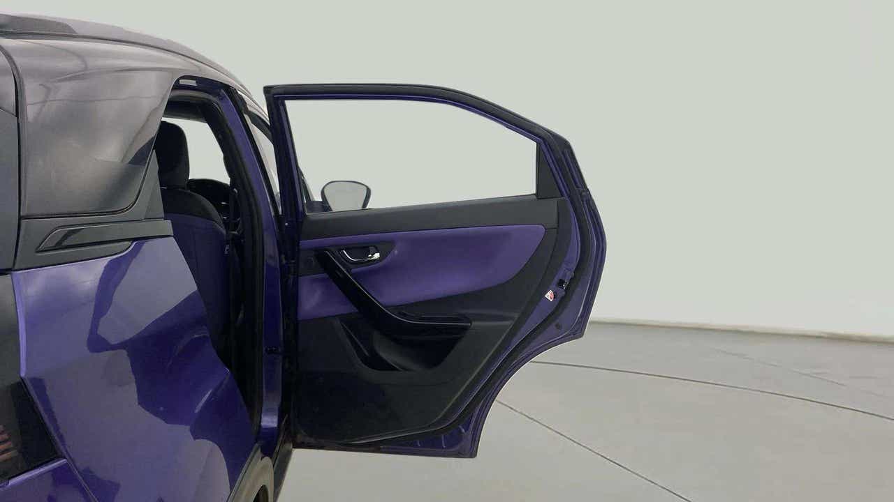 Rear door open view of a Tata Nexon
