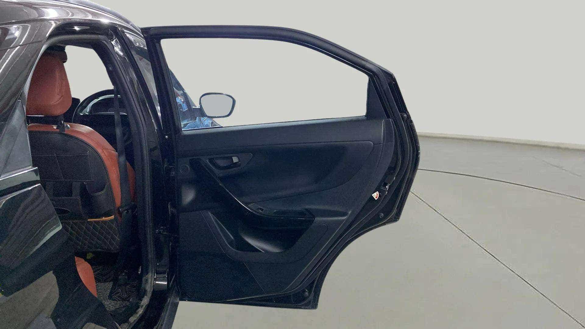 Rear door interior view of a Tata Nexon