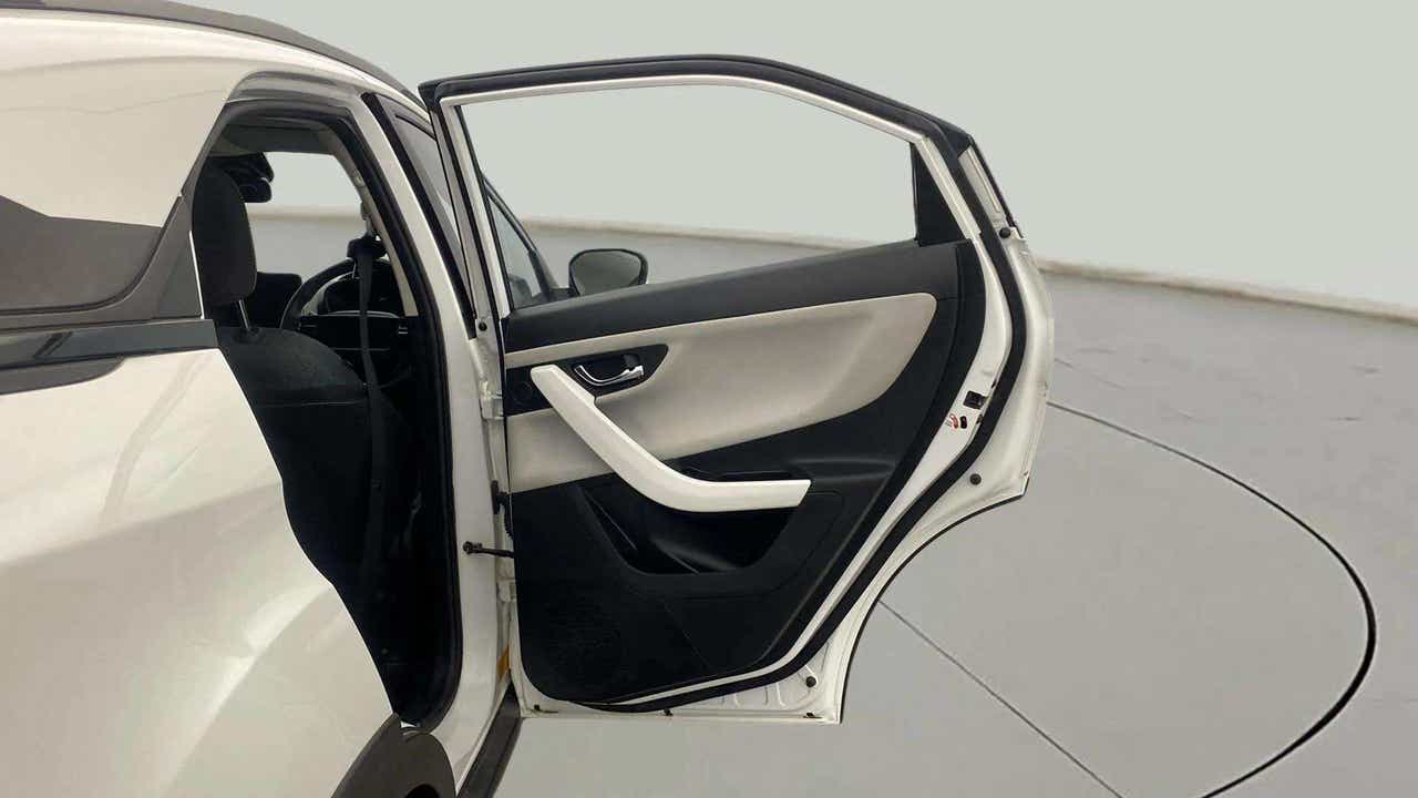 Rear left door panel view of a Tata Nexon