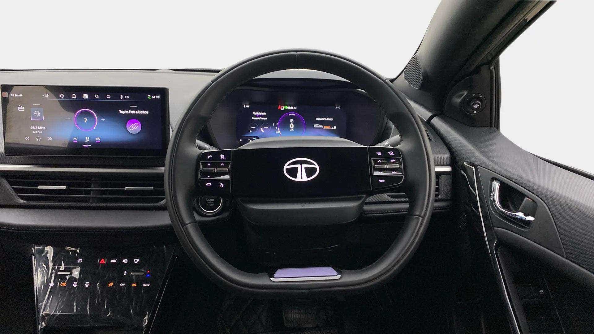 Dashboard and steering wheel of a Tata Nexon