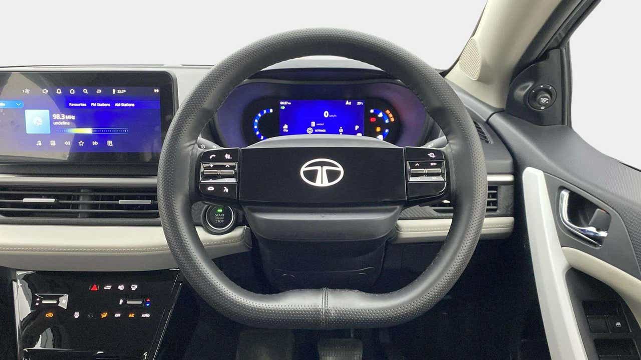 Dashboard and steering wheel of a Tata Nexon