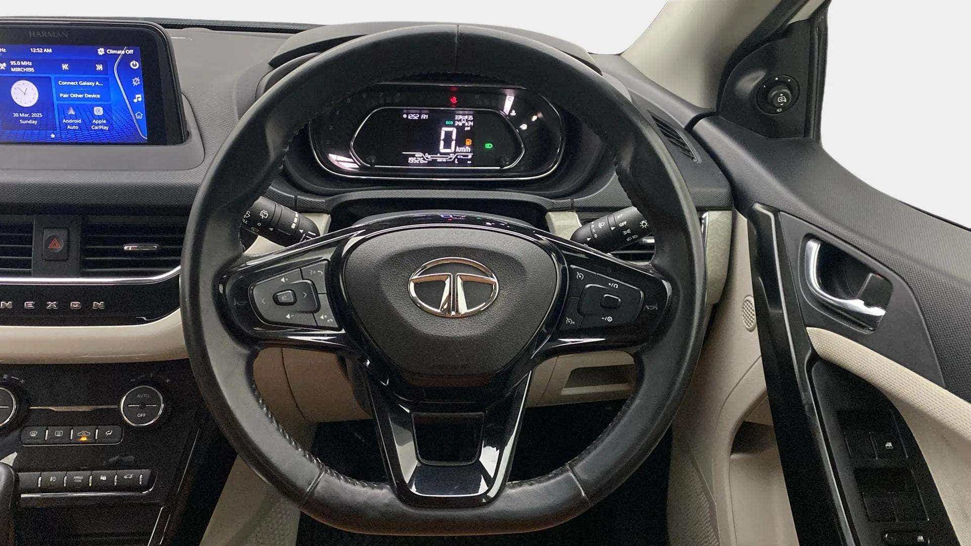 Steering wheel and dashboard of a Tata Nexon 2017-2023