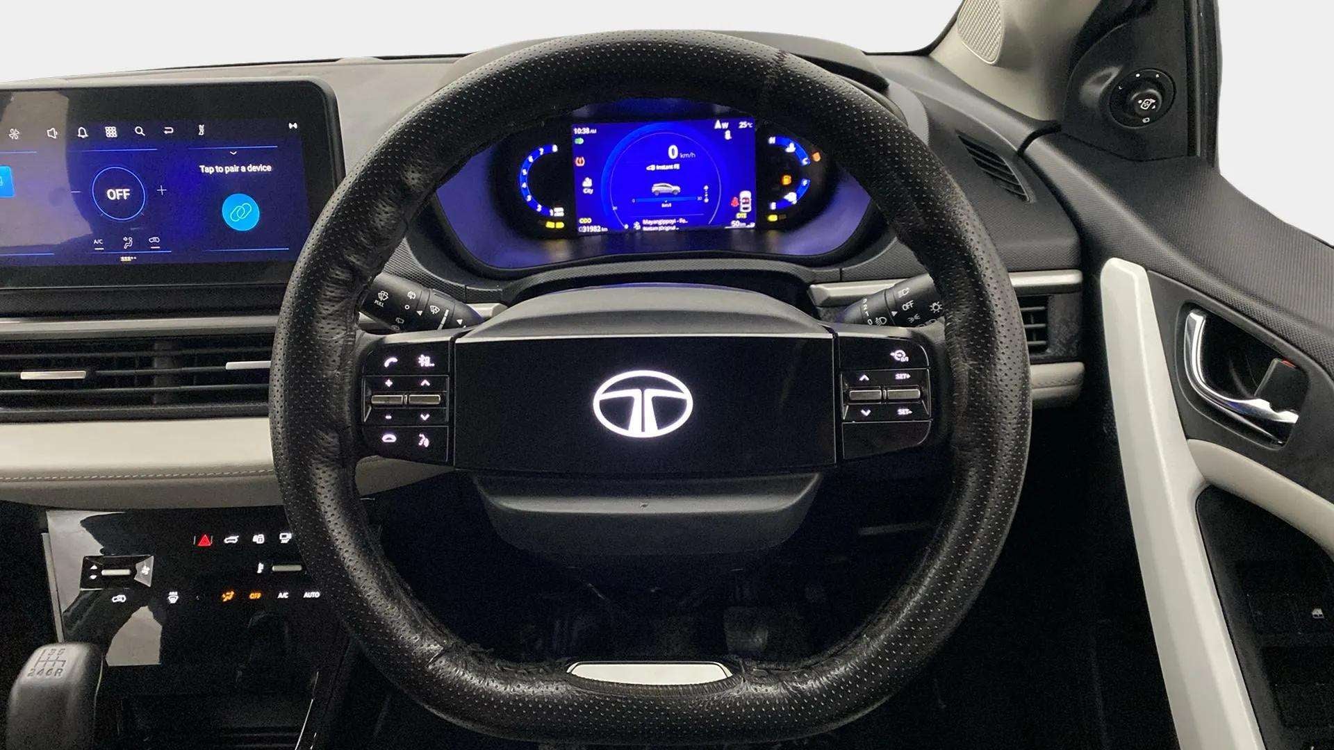 Steering wheel and dashboard of a Tata Nexon 2017-2023