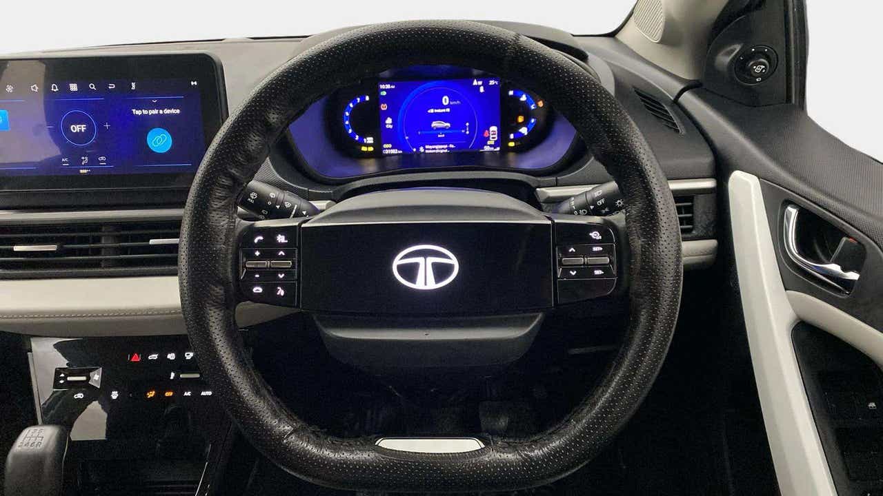 Steering wheel and dashboard of a Tata Nexon 2017-2023